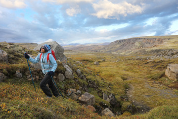 Woman practicing Nordic walking