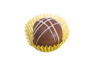 Homemade chocolate truffle.  Overhead of candy ball in white background.