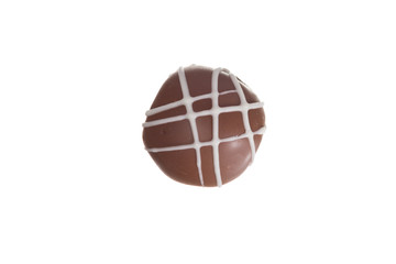Homemade chocolate truffle.  Top view of isolated candy ball.