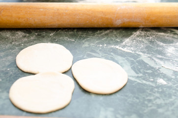 The process of making delicious home-made dumplings with meat.