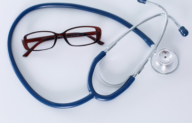 docter workplace with a stethoscope Cardiogram chart with medical table closeup,for heart record
