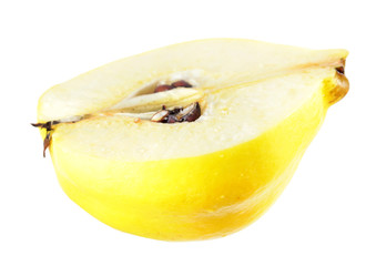 Quince cut in half inside longitudinal section isolated on white background