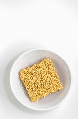 Top view of Isolated Instant Noodles in White ceramic bowl on white background with clipping path