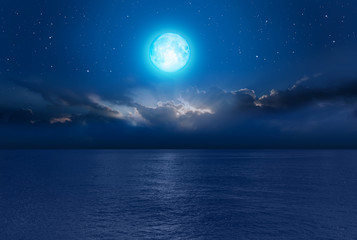 Obraz na płótnie Canvas Night sky with moon in the clouds 