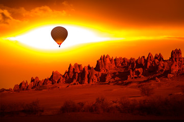 Hot air balloon flying over spectacular Cappadocia