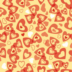 Seamless pattern with hearts on a yellow background for the design of a Valentine's day holiday