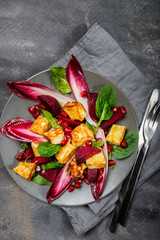 Pomegranate, beetroot, red chicory, spinach, mint and halloumi salad