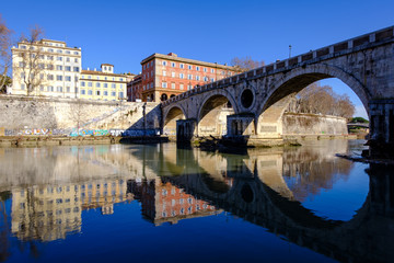 Travel photography - walking along the banks of the Tiber (Rome, Italy, Europe).