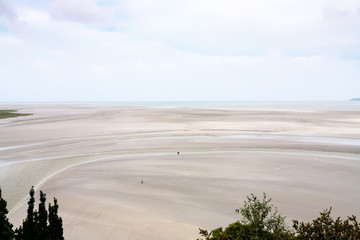 muddy tidal bay near Le Mont Saint-Michel island