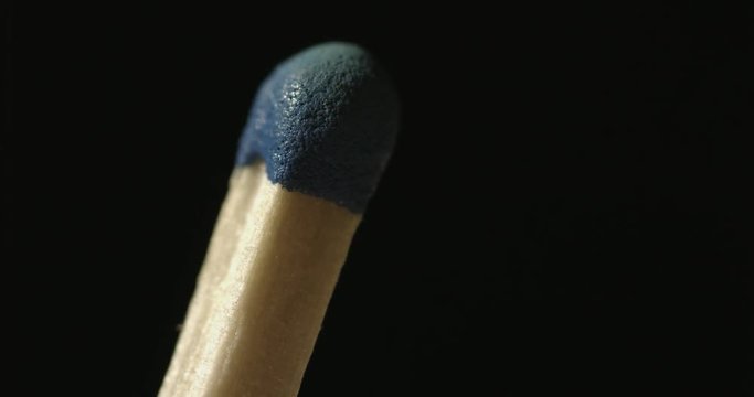 Match lighting and burning. Extreme macro shot on black background