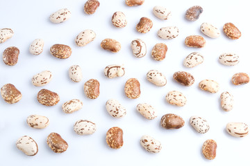 Big light brown bean grain, bean pod, a lot of beans texture pattern background for web design and sale. time to plant or cooking. on white background with space for text