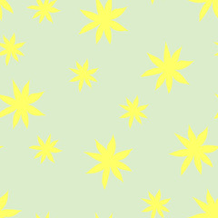 Seamless background with yellow daisies over green