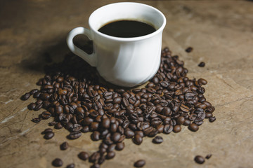 Coffee and a cup of coffee on the table.