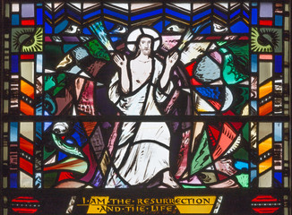 Naklejka na ściany i meble LONDON, GREAT BRITAIN - SEPTEMBER 16, 2017: The scene of Resurrection the stained glass in church St Etheldreda by Charles Blakeman (1953 - 1953).