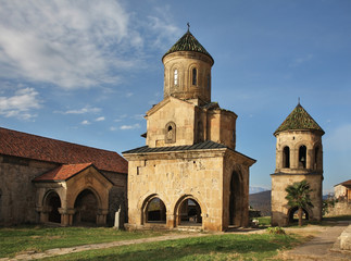 Church of St. Nicholas and bell tower at Gelati Monastery of Theotokos near Kutaisi. Imereti Province. Georgia