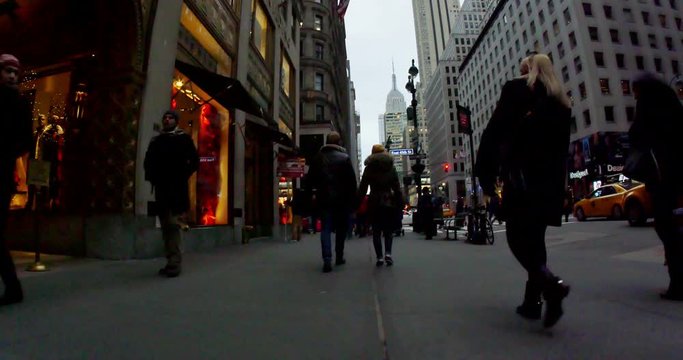 New York City,USA - November 2014: 4K Video of a couple walking down a street in Manhattan