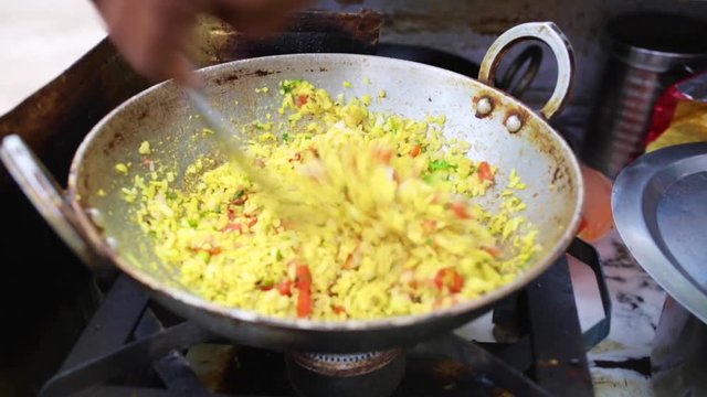 preparing poha