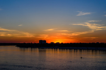 Obraz premium Beautiful sunset over the river Dnieper