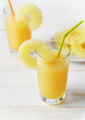 Two glasses of pineapple juice