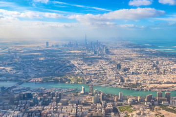 Naklejka premium Aerial view of Dubai from airplane