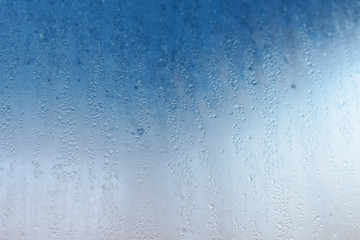 Naklejka na ściany i meble Wetted glass, water droplets, soft focus