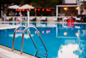Obraz premium Swimming pool with stair at hotel