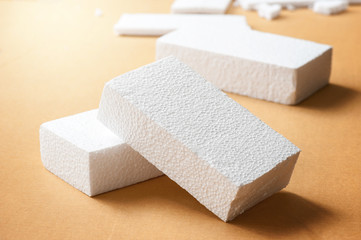 White polystyrene foam, material for packaging or craft applications - obrazy, fototapety, plakaty