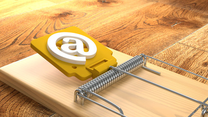 Mousetrap on wooden floor with an at symbol phishing cybersecurity concept