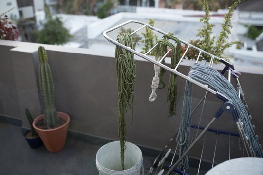 Dyed thread drying on rack