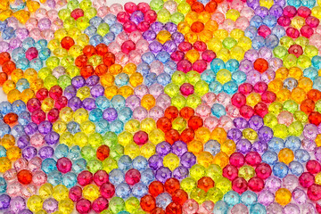 Fototapeta na wymiar background of colored beads, background of flowers made of colored beads
