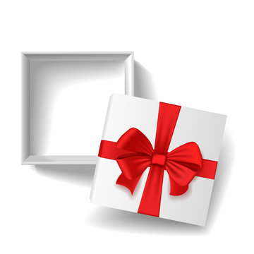 Open a blank white box with lid and red bow.