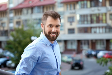 Fototapeta premium Handsome man in casual clothes outdoors