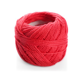 Red yarn ball on white background