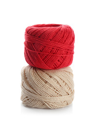 Colorful yarn balls on white background