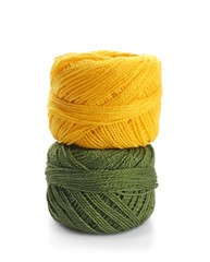 Colorful yarn balls on white background