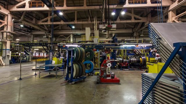 Employees Work with Equipment Producing Tires Time Lapse