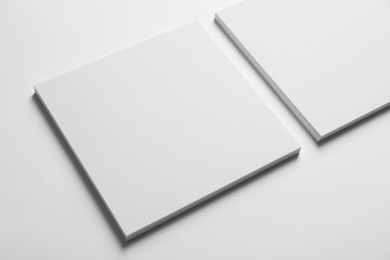 Blank sheets of paper on white background. Mock up for design