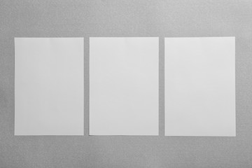 Blank sheets of paper on light background. Mock up for design