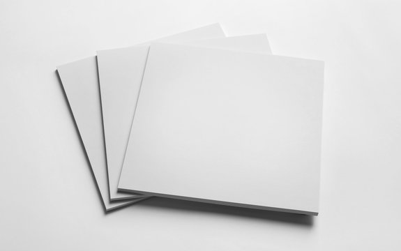 Blank sheets of paper on white background. Mock up for design