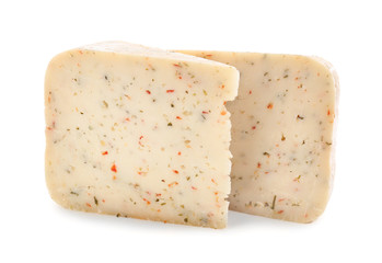 Pieces of delicious cheese on white background