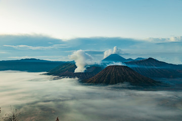 Mount Bromo volcano (Gunung Bromo), semeru and Batok during sunrise from viewpoint on Mount Penanjakan, in East Java, Indonesia.