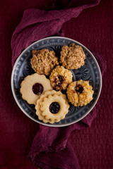 Grandmas tasty christmas cookies decorated on a kitchen table