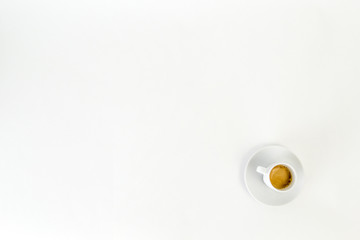 White cup of coffee on white background