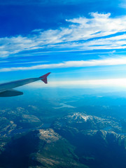 Fototapeta premium Beautiful sky and land view from plane