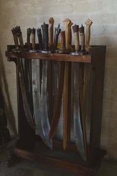 Sword arranged on wooden rack