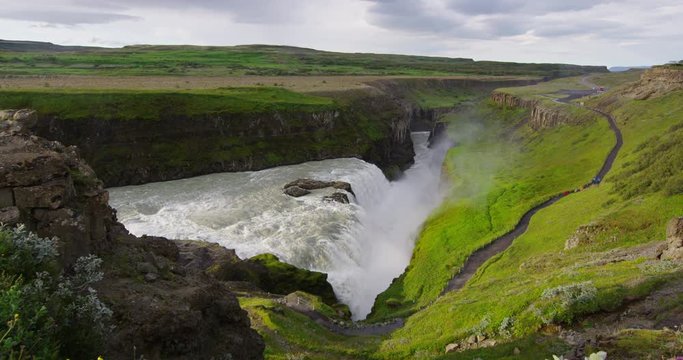 Waterfall Gullfoss on Iceland in Icelandic nature. Gullfoss aka Golden Falls is a famous tourist attraction and landmark destination on Iceland on the Golden Circle, RED EPIC SLOW MOTION.