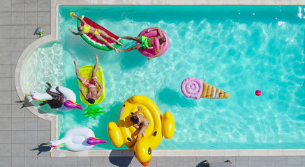 Friends having fun in a swimming pool