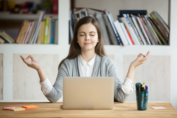 Calm woman relaxing meditating with laptop, no stress free relief at work concept, mindful peaceful young businesswoman or student practicing breathing yoga exercises at workplace, office meditation - obrazy, fototapety, plakaty