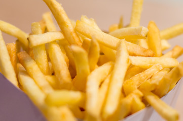 French fries or chips in the box.