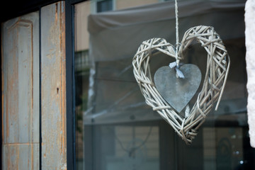 Horizontal View of a Wooden Heart Hanged Inside A Shop.